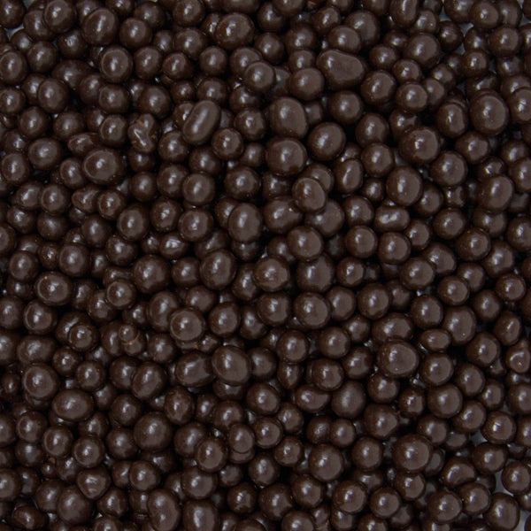 Semillas muy pequeñas de forma ovalada cubierta con chocolate sin azúcar.